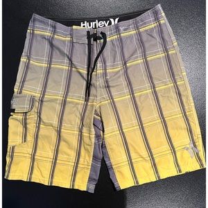 Hurley Board Shorts. Size 34. Plaid with white,  gray and yellow.